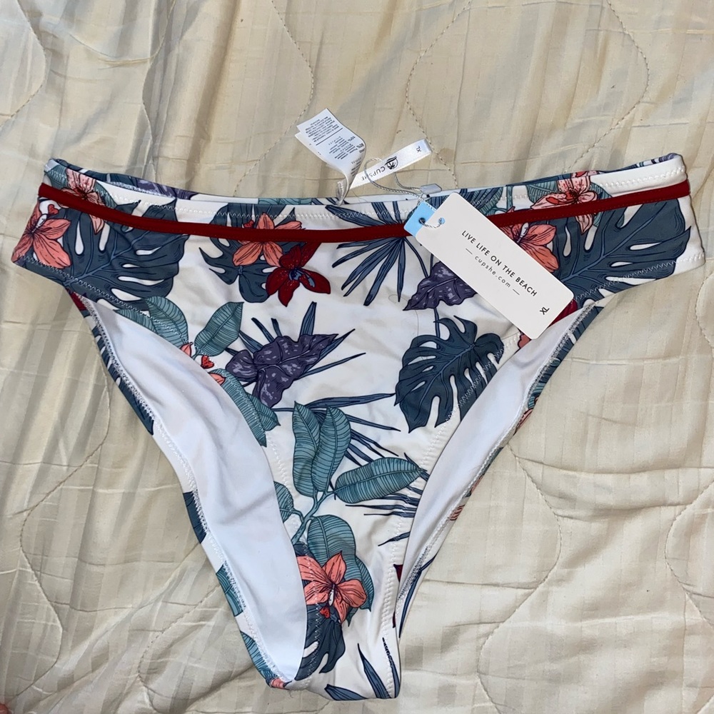 Swimsuit bottom with palm pattern. Brand new never worn.